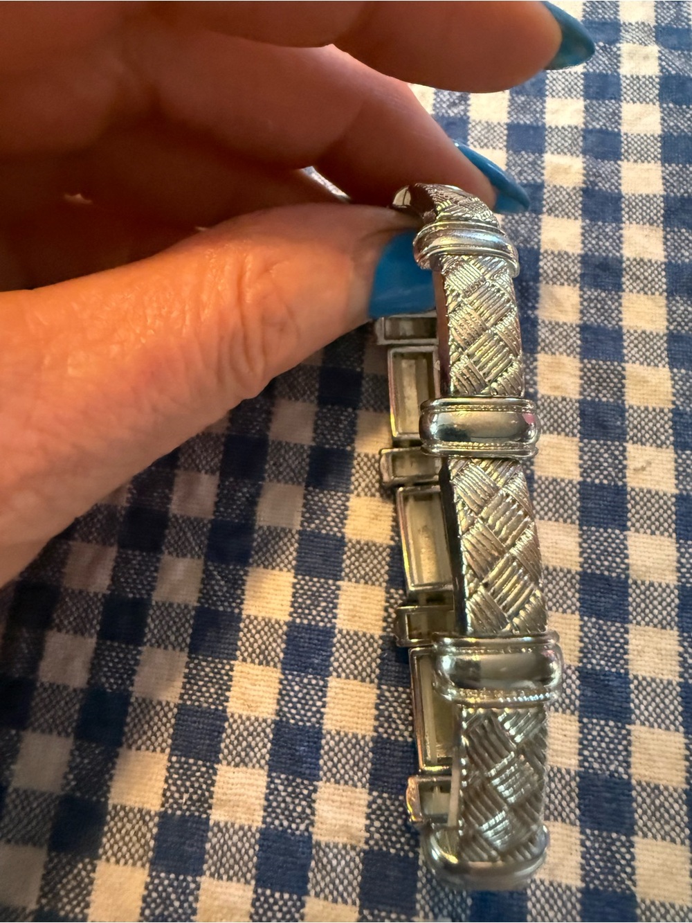 a vintage silver-toned looks like buckle bracelet , slip on  , stretch 7”